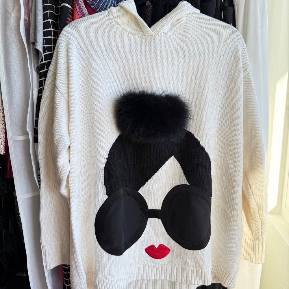 Alice + Olivia Stylish Cream Hooded Sweater with Iconic Graphic and Faux Fur Bun